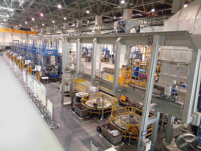 Casting line with furnace shuttle in basement Casting line for the production of engine blocks