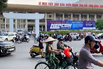 Lively traffic in Hanoi as a symbol of the dynamic economic growth in Vietnam