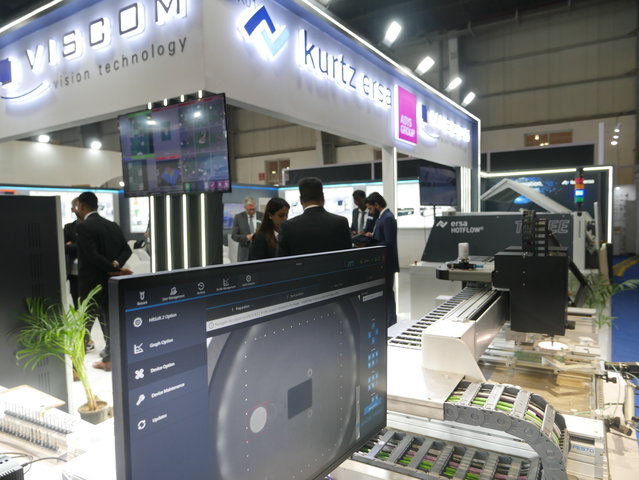 A focused work atmosphere among the entire trade show team A focused work atmosphere among the entire trade show team