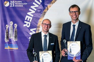 Accepting an SMT Technology Award on behalf of Ersa: Robert Schirmacher (left), Product Manager Selective, and Jörg Nolte, Product Manager Rework & Inspection