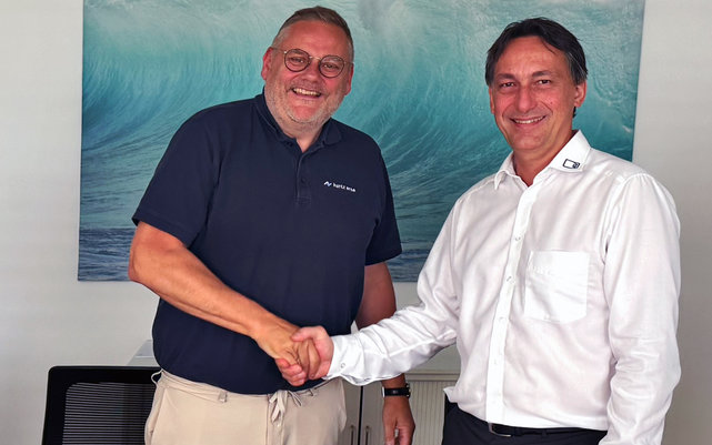 Thomas Mühleck, CEO Kurtz Ersa Group, shaking hands with Alexander Tschernev, former Managing Director and shareholder of ATV Technologie GmbH Thomas Mühleck, CEO Kurtz Ersa Group, shaking hands with Alexander Tschernev, former Managing Director and shareholder of ATV Technologie GmbH