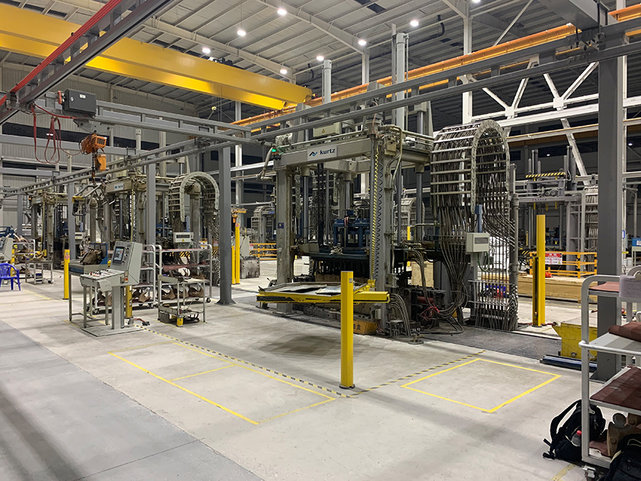 Casting line with furnace shuttle in the basement, e.g. for the production of axle beams as hollow castings Casting line for the production of wheel carriers and complete axle carriers