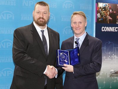 NPI Innovation Award for the Ersa Rework System HR 600 XL - Todd DeZwarte (left), Salesman at Kurtz Ersa, Inc. accepts the award